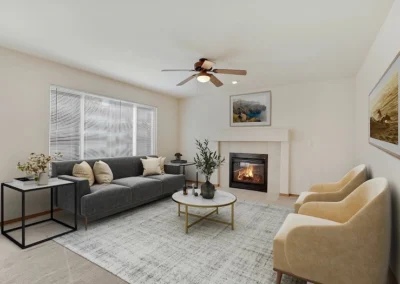 Digitally staged living room with a fireplace, designed to showcase interior potential for listings.
