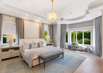 Expertly edited bedroom photo showing clear window views and crisp interior details.