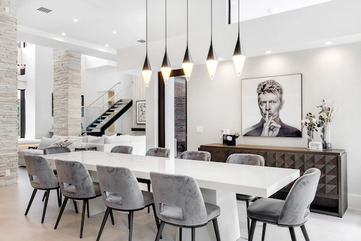 Professionally edited living room with brightened exposure, corrected verticals, and realistic window reflections.