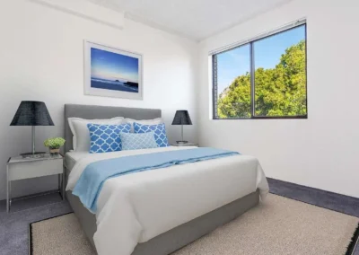 A bright, modern bedroom featuring virtual staging to help property buyers visualize their new home.